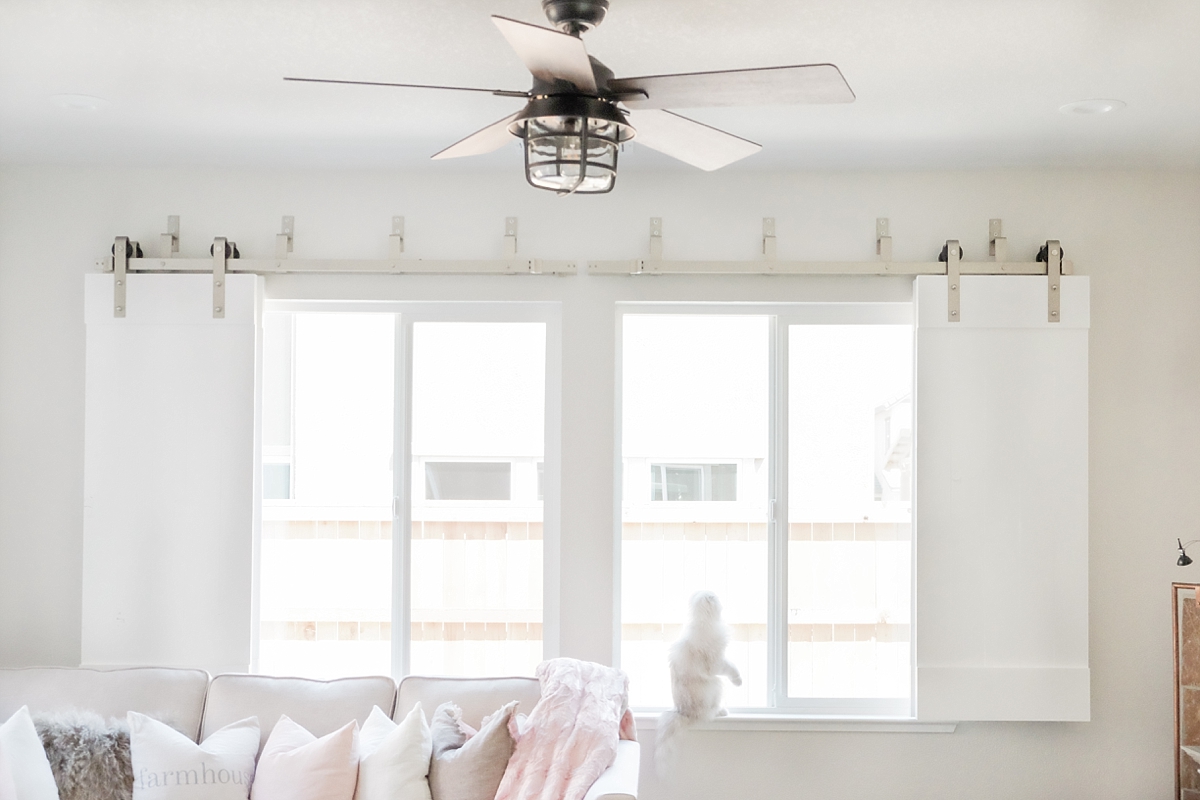 Living room with barn door shutters